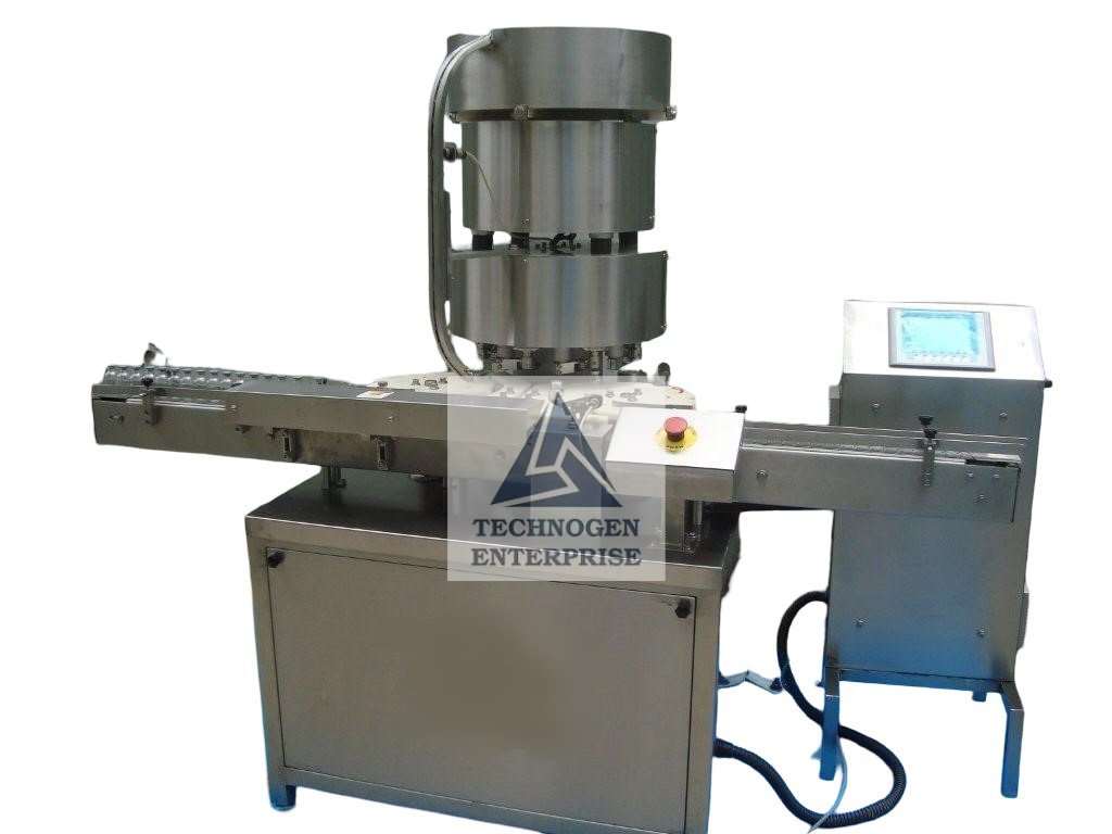 Vial Capping Machines | Technogen Enterprise Automatic vial cap sealing machine by Technogen Enterprise